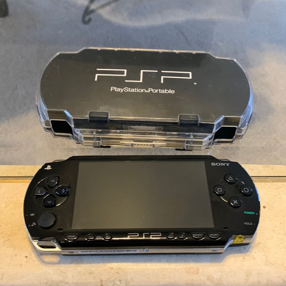 PSP handheld gaming device. Bought brand new $249.00 want to sell for $140.00